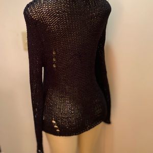 Distressed see through sweater in black with long sleeves